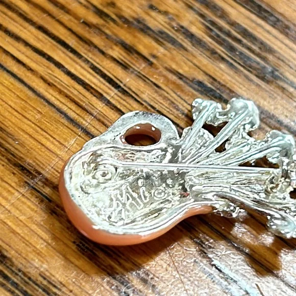 Assorted costume jewelry.  Includes 8 pieces. Seven pins and 1 bracelet. - Picture 3 of 10